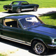 A photo of a dark green 1967 Ford Mustang.